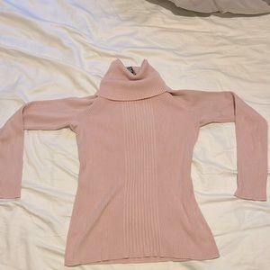 Sweater is light pale pink, partially ribbed, turtleneck, and mint condition.
